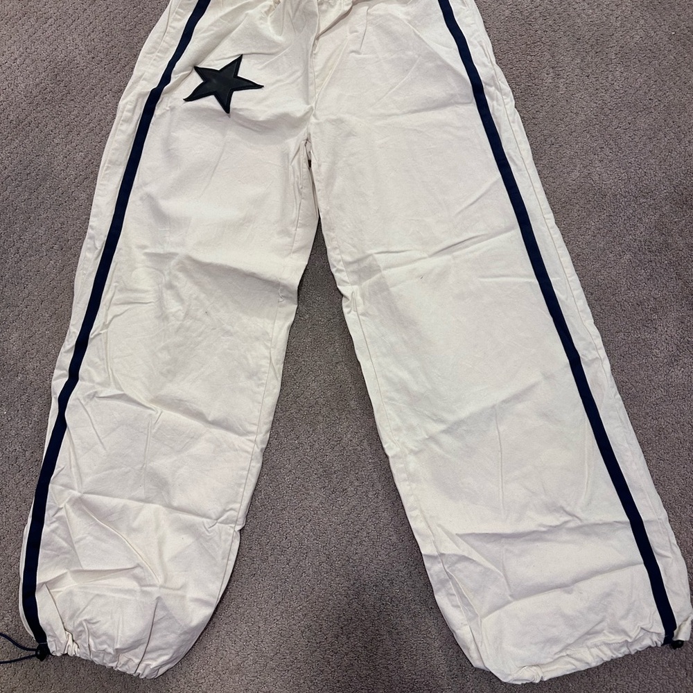 White Track Pants with Black Star Detail
